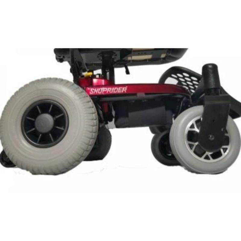Close-up of a Shoprider jimmie scooter with large wheels on a white background
