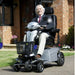 Quingo Toura 2 mobility scooter man on scooter 