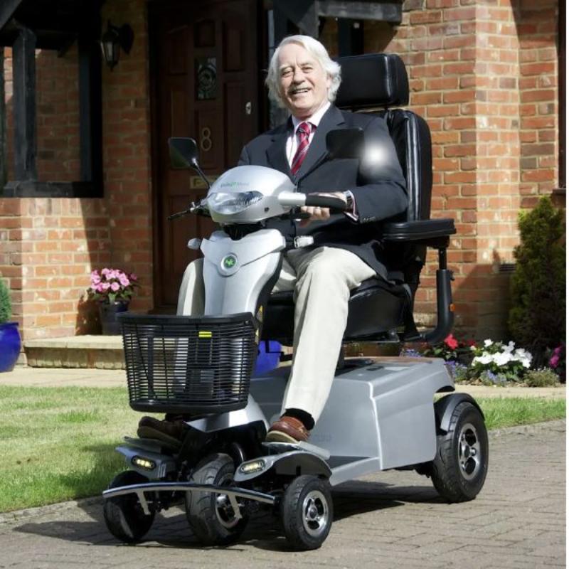 Quingo Toura 2 mobility scooter man on scooter 