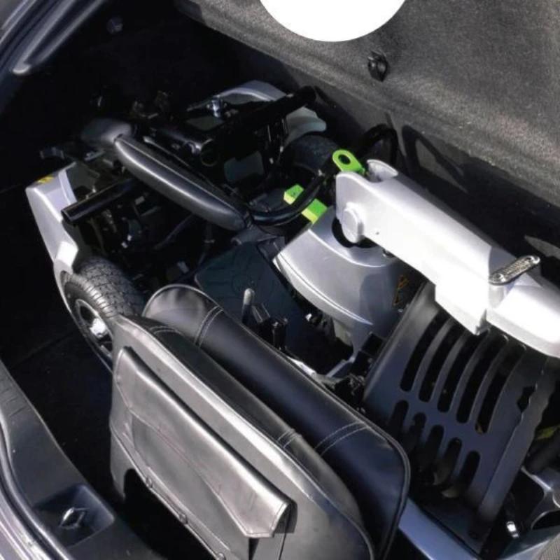 Quingo Ultra Mobility Scooter inside of car trunk 